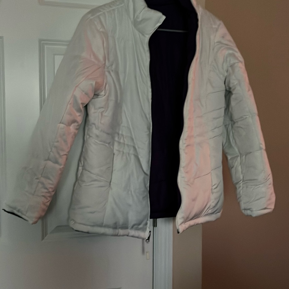 Reversible winter coat.. excellent condition.  Pockets on both sides